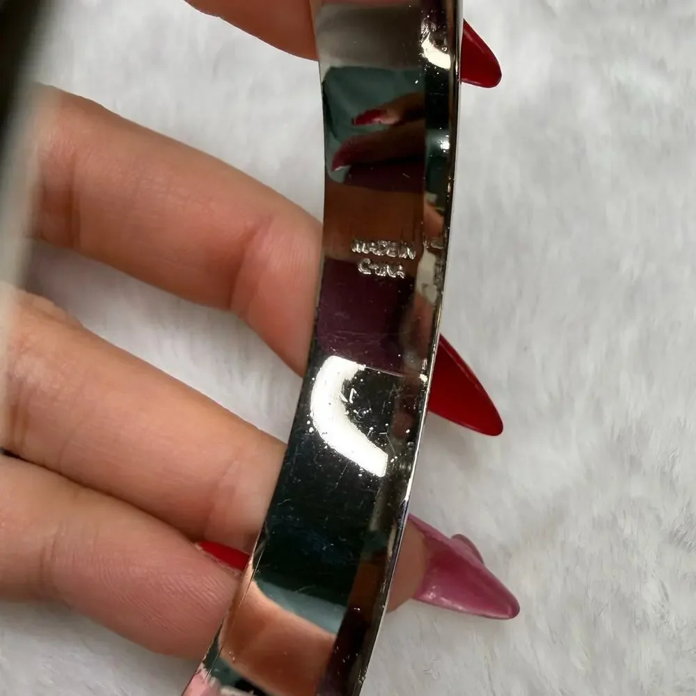 COACH Silver-Tone Quilted C Bangle Bracelet - Picture 5 of 7